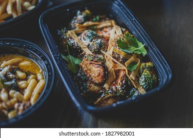 Brussel Sprouts And Pasta In Takeout Containers