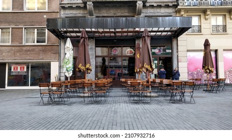 BRUSSELS, BELGIUM - 01 17 2022: Empty Chairs Outside Of The Big Game Sports Bar Near Beurs In The Center Of Brussels. Horeca Suffering Due To Covid-19 Lockdown