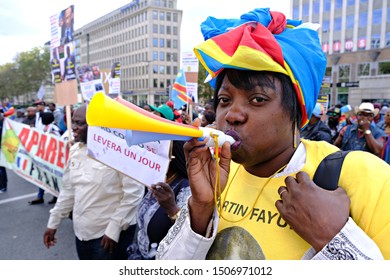 Brussels, Belgium. 17th September 2019. People Hold Signs And Shout Slogans As They Protest The State Visit Of President Of The Democratic Republic Of Congo Felix Tshisekedi.