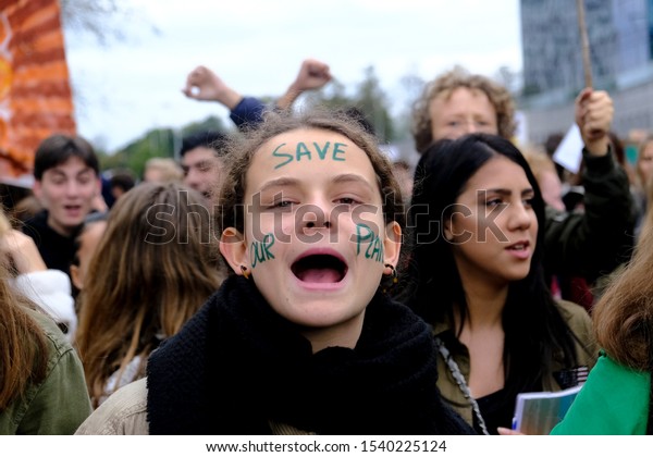 Brussels, Belgium. 24th October 2019.\
Protesters march during a student strike action organized by \'Youth\
For Climate\', urging pupils to skip classes to protest against a\
lack of climate\
awareness.\
\
