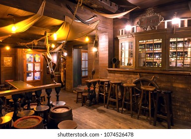 BRUSSELS, BELGIUM - APR 2: Interior Of Old Schooner Style Bar With Old Wooden Furniture, Pirate Themes Decor, Pub Counter And Barrels On April 2, 2018. More Than 1,200,000 People Lives In Brussels