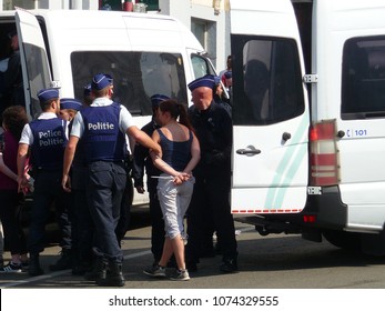 Brussels, Belgium - April 22, 2018: Police Making Arrests During A Silent March Pro Life Against Abortion And Euthanasia In Downtown Brussels