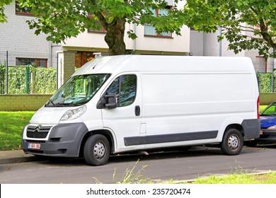 BRUSSELS, BELGIUM - AUGUST 9, 2014: White cargo van Citroen Jumpy at the city street.
