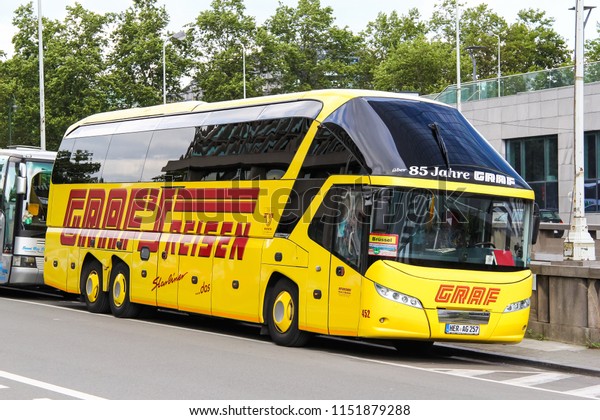 Brussels,\
Belgium - August 9, 2014: Luxury touristic coach bus Neoplan\
N5218/3SHDL Starliner in the city\
street.