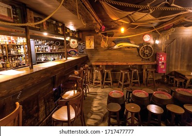 BRUSSELS, BELGIUM: Empty Bar With Old Schooner Interior, Old Barrels, Wooden Furniture And Pub Counter Without Bartenders On April 2, 2018. More Than 1,200,000 People Lives In Brussels