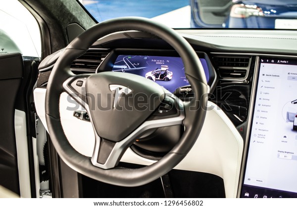 Brussels, Belgium, Jan 18, 2019: metallic white
Tesla Model X at Brussels Motor Show, produced by American
automaker Tesla, main shareholder Elon Musk, control board,
steering wheel, upholstery,
seats