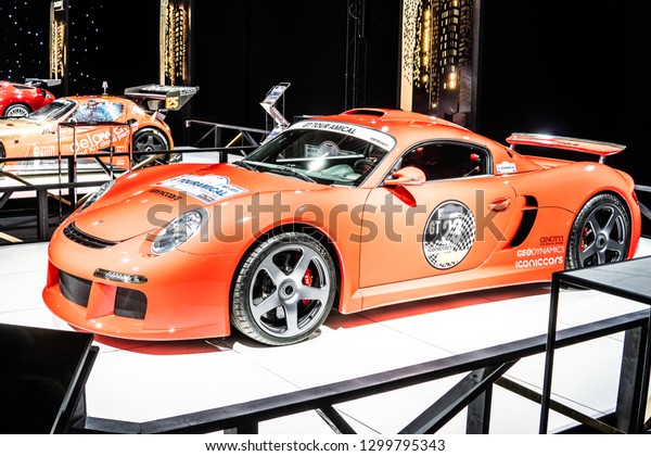 Brussels, Belgium, Jan 18,\
2019: metallic red Ruf CTR3 at Brussels Motor Show, Dream Cars,\
mid-engined sports car produced by German car manufacturer Ruf\
Automobile