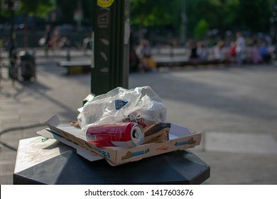 Brussels, Belgium - June 1 2019 : Trash Composed Of Beer Can, Plastic Water Bottles And Old Pizza Box On Trash Can.