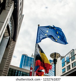 BRUSSELS, BELGIUM - MAY 20, 2015: European Parliament offices and European flags. - Shutterstock ID 1232761837