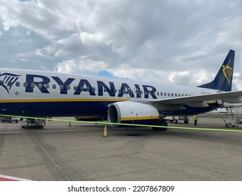 Brussels, Belgium - September 25, 2022: Low Cost, Budget Irish Airlines Ryanair Plane At Brussels Zaventem Airport. People Leaving Airplane After Arrival. Logo, Emblem And Name On Plane Side