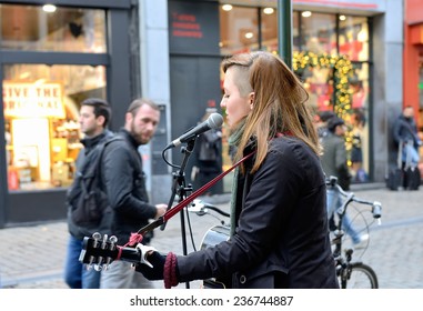 BRUSSELS, BELGIUM-DECEMBER 6, 2014: Street Singers In Historical Center Of Brussels Are One Of The Attractions Of The Old City