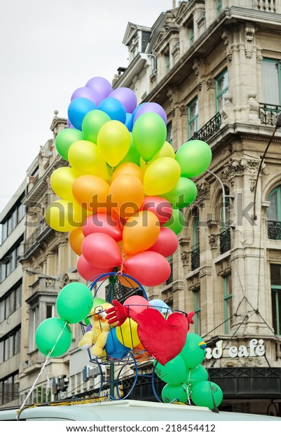 BRUSSELS, BELGIUM-MAY\
15, 2010: Balloons composition in colors of Gay Pride Parade\
exposed in this gray day on streets during defile. This parade is\
annual event in\
Brussels