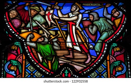 BRUSSELS - JULY 26: Stained glass window depicting the First Crusade and Godfrey of Bouillon, in the cathedral of Brussels on July, 26, 2012.