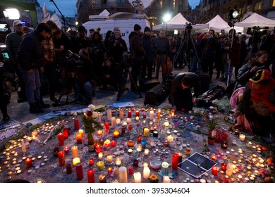 BRUSSELS - MARCH 23: People gathered in front of the Stock Exchange to remember the victims of the terrorist attacks that took place on March 22. Photo taken on March 23, 2016 in Brussels, Belgium. 
