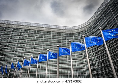 BRUSSELS - MAY 30, 2016: Row Of European Union Flags Fly In Front Of The The Berlaymont Building, Home To The Headquarters Of The European Commision.