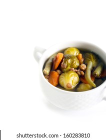 Brussels Sprout And Lentil Soup On White Background