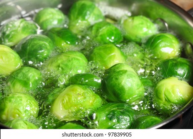 Brussels sprouts boiling in water.