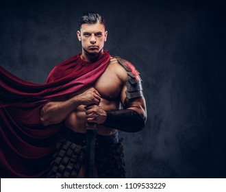 Brutal ancient Greece warrior with a muscular body in battle uniforms - Shutterstock ID 1109533229