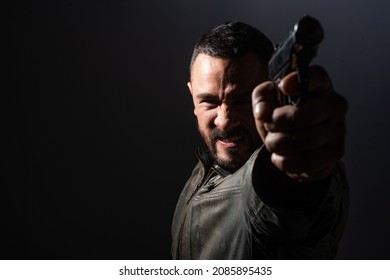 Brutal Angry Gang Man Lifestyle. Gangster In Action, Killer Aiming Pistol Gun. Guy Shooting Firearm Handgun, Makarov Pistol In A Firing Range