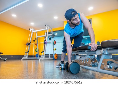 Brutal Athletic Man Pumping Up His Back Muscles To Be Stronger With Copy Space