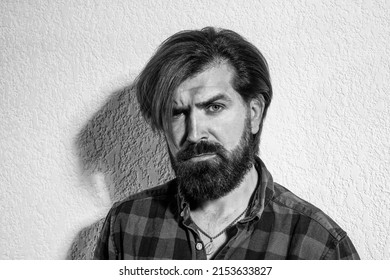 brutal bearded man wear casual checkered shirt. male fashion and beauty. brutal caucasian hipster with moustache. male barber care. confident and handsome brutal guy. charisma