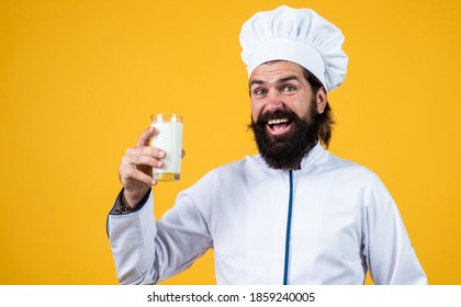 Brutal Man With Moustache And Beard In Uniform Drinking Milk, Health.