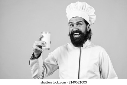 Brutal Man With Moustache And Beard In Uniform Drinking Milk, Health