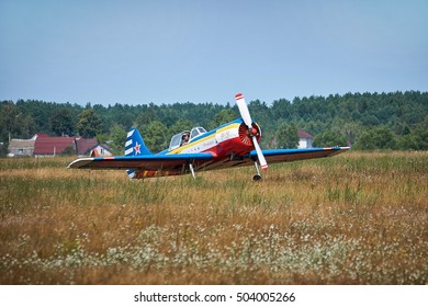 BRYANSK/RUSSIA - JULY 16, 2016: Russian training sports plane YAK-50 on the field