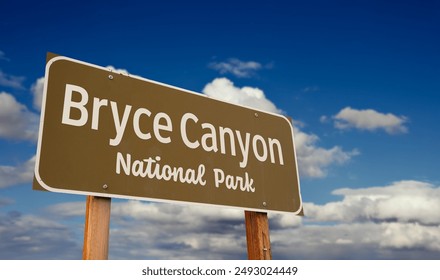 Bryce Canyon National Park (Utah) Road Sign Against Blue Sky and Clouds. - Powered by Shutterstock