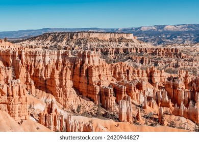 Bryce canyon national park in winter, unique rock formations in utah covered in snow, orange rocks in snow, cold winter in the usa - Powered by Shutterstock