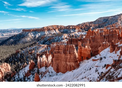 Bryce canyon national park in winter, unique rock formations in utah covered in snow, orange rocks in snow, cold winter in the usa - Powered by Shutterstock