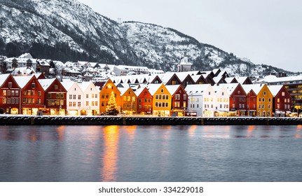 Bryggen Street With Wooden Colored Houses In Bergen At Christmas, Norway