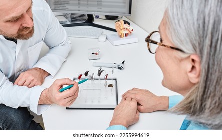 BTE hearing aids are recommended by audiologist to his elderly female patient because it is best hearing solutions for her. Hearing aids - Powered by Shutterstock