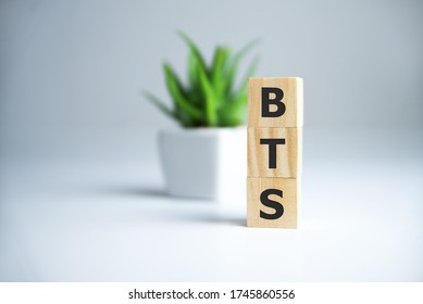 BTS word concept on cubes on white background.