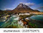 Buachaille Etive mor mountain with the river Coupall, known also as Glencoe mountain. located in the heart of Glencoe, Highlands Scotland.