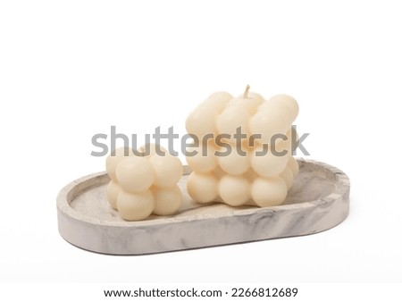 Bubble candle isolated on white background. Decor for home interior.