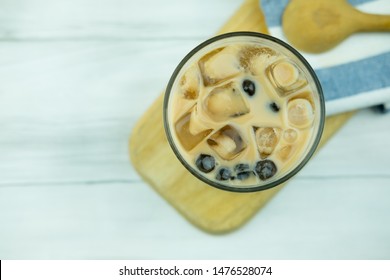 Bubble Milk Tea With Tapioca Pearl Ball In Drinking Glass, Top View