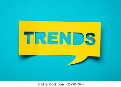 Bubble speech with cut out phrase "trends" in the paper. - Shutterstock ID 369907340