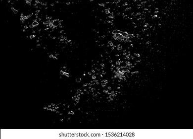 A Bubble Splash In Transparent Clear Water Liquid On A Black Nature Background