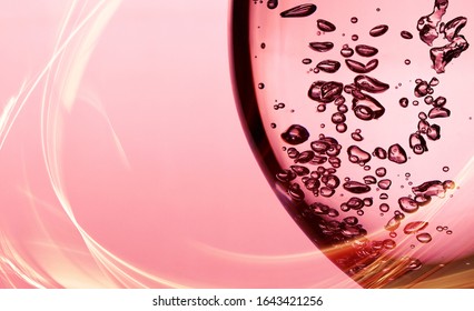 A bubble splash of transparent clear water liquid in glass at sunlight. Gift or post card. Background
