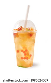 Bubble Tea, Isolated on White Background – Colorful, Fresh Orange Boba Drink with Fruit Fizzy Jellies and Ice Cubes, Wet with Droplets – Close Up Macro on Transparent Plastic Cup with Straw and Lid 