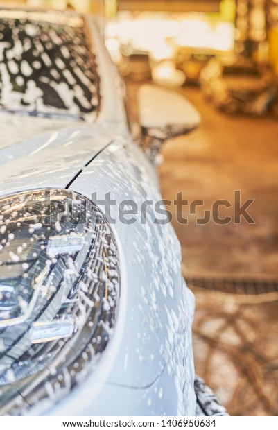 Bubble Wash\
Foam On White Car Surface, Car\
Washing.