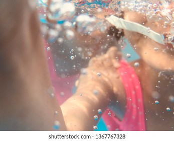 Asian woman pouring nude body with water before the pool