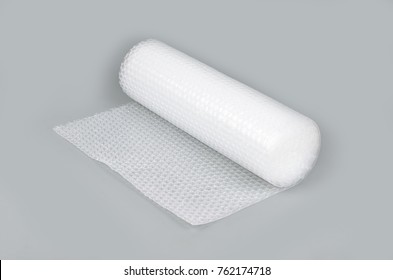 Bubble wrap in a roll on a gray background