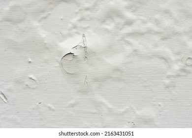 Bubbled Paint On A Wall. Paint Damaged By Water. Poorly Isolated Wall With Bubbling Paint.