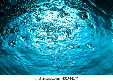 BUBBLES IN BLUE WATER