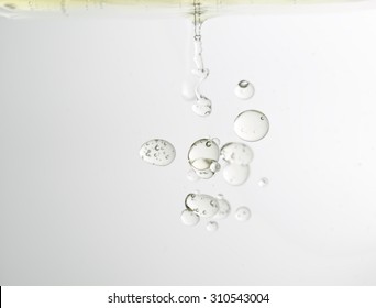 Bubbles Of Canola Oil In Water