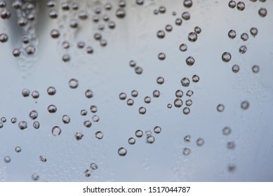 Bubbles: Close Up Of Carbonated Bubbles Inside A Glass Of White Wine Spritzer