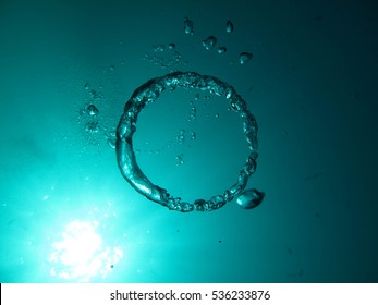 Bubbles floating to the surface in the sea