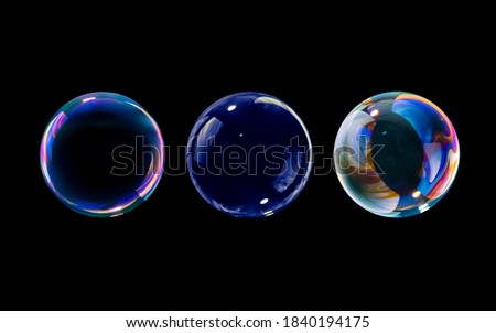 BUBBLES ISOLATED ON BLACK BACKGROUND